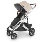 UPPAbaby Cruz V2 Stroller for Infants and Toddlers - Declan - Oat Mélange with Silver Frame and Chestnut Leather – Large Storage Basket, UPF 50+ Canopy, No-Rethread Harness